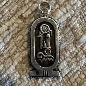 Egyptian hieroglyphics charm.